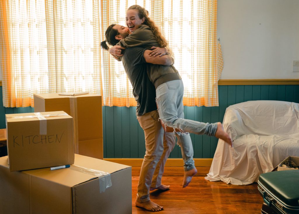 Couple ecstatic about being new homeowners with the help of a mortgage loan in Connecticut