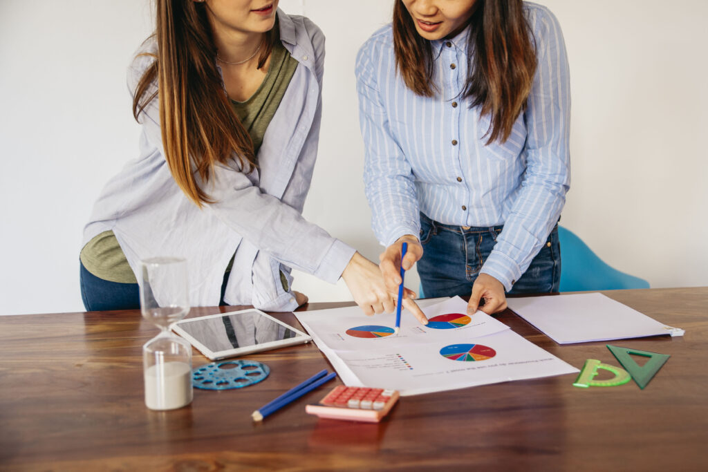 Girls analyzing various home mortgage scenarios