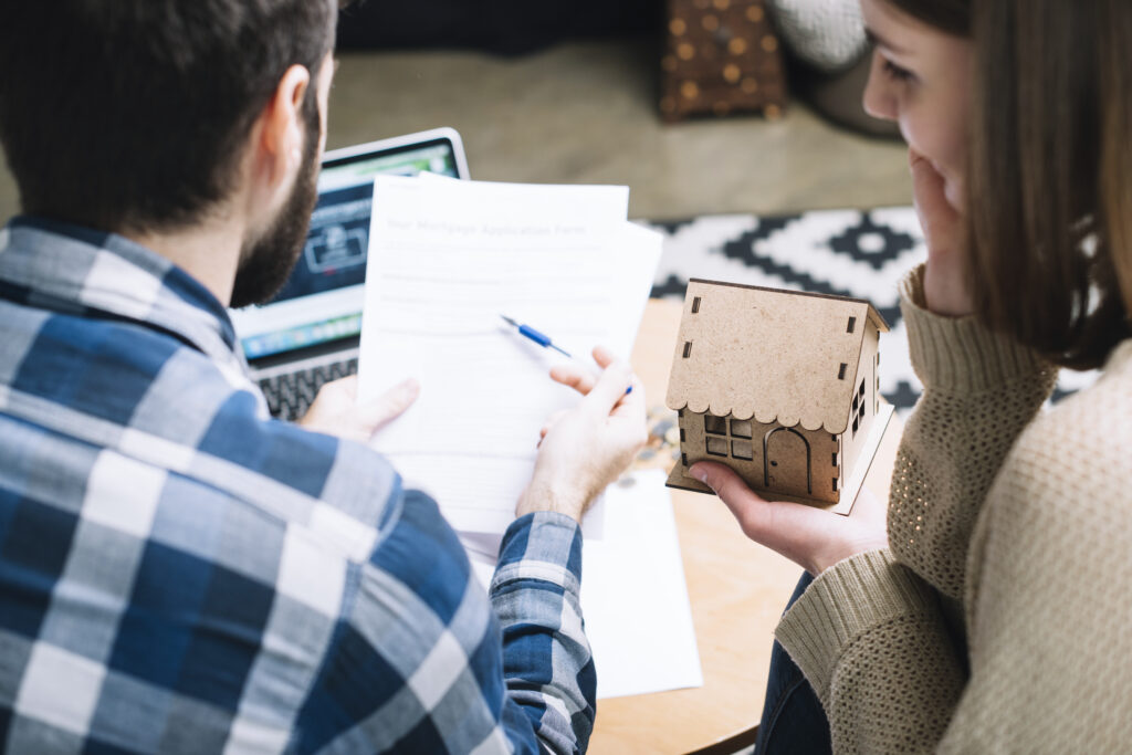 Couple discussing their home mortgage agreement