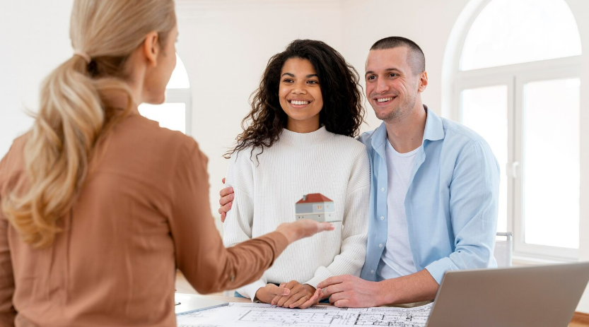 A couple buying their first house by mortgage loan
