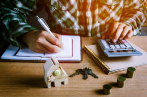 A man calculating risks in mortgage