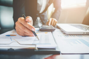 A man managing financial investments including mortgage